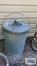 Small galvanized trash can with locking lid