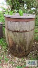 Wooden nail keg with planter