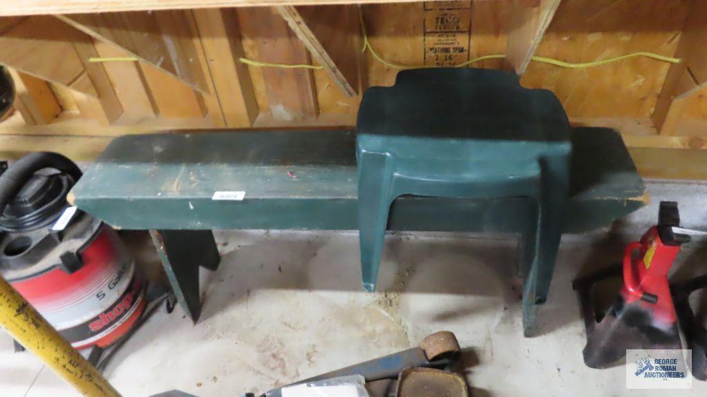 Wooden bench and plastic stool