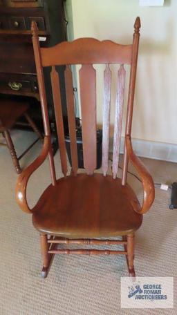 Wooden rocker with bent arms