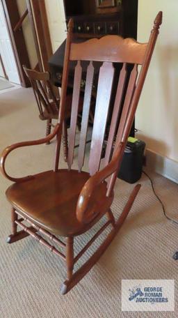 Wooden rocker with bent arms