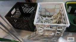 Plastic basket and two plastic crates with extension cord