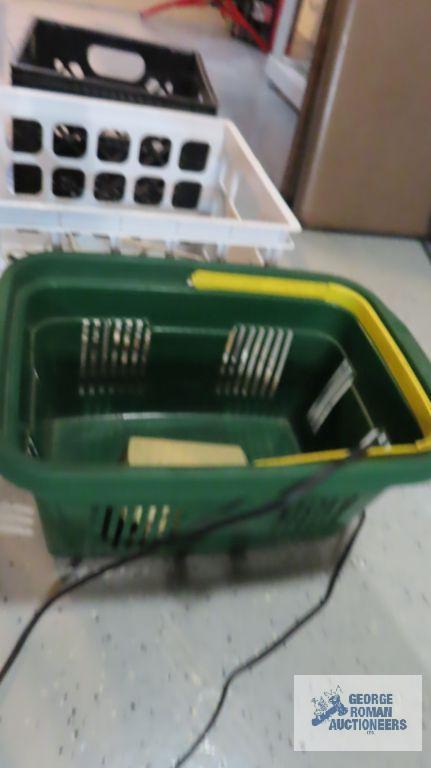 Plastic basket and two plastic crates with extension cord