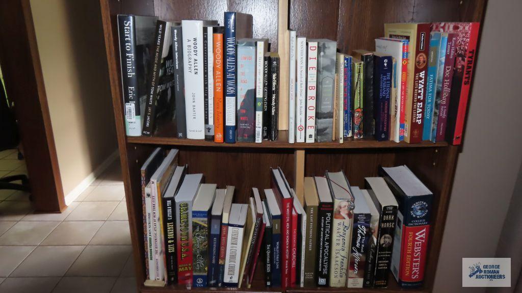 Two shelves of books dealing with history and biographies