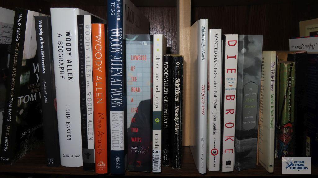 Two shelves of books dealing with history and biographies