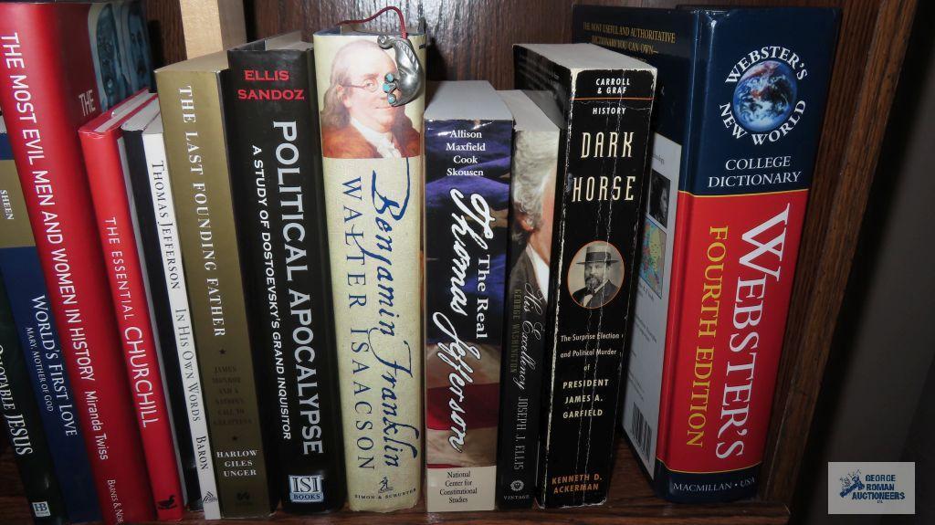 Two shelves of books dealing with history and biographies