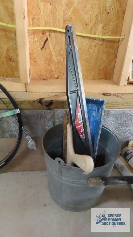 Galvanized bucket with drywall tools