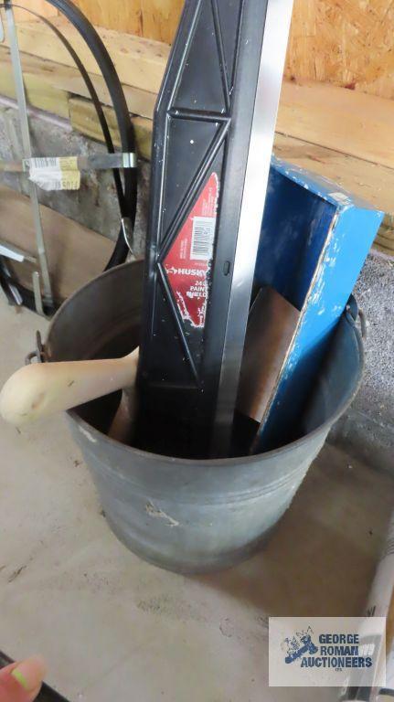 Galvanized bucket with drywall tools