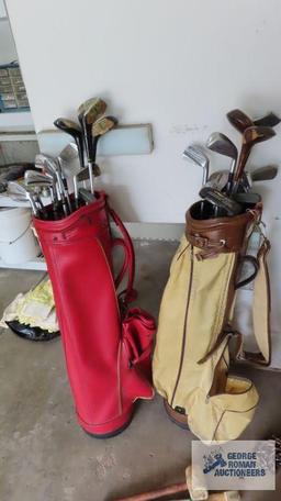 Golf bags with assorted clubs