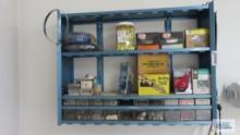 Assorted hardware on blue wall shelf, shelf is included