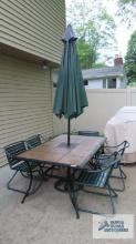Outdoor patio...set with umbrella and five chairs