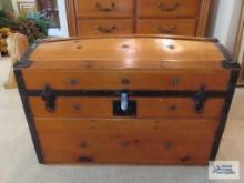 Wooden trunk with picture on inside of lid