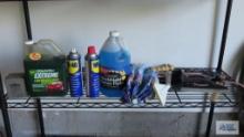 Lot of WD-40...and other automotive accessories and umbrellas