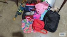 Lot of assorted handbags and umbrellas