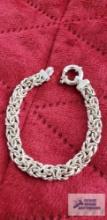 Silver colored bracelet marked 925 16.2 G (Description provided by seller)