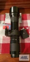 Nikkor 400 mm lens with ring and Nikon teleconverter TC300 2x lens attached