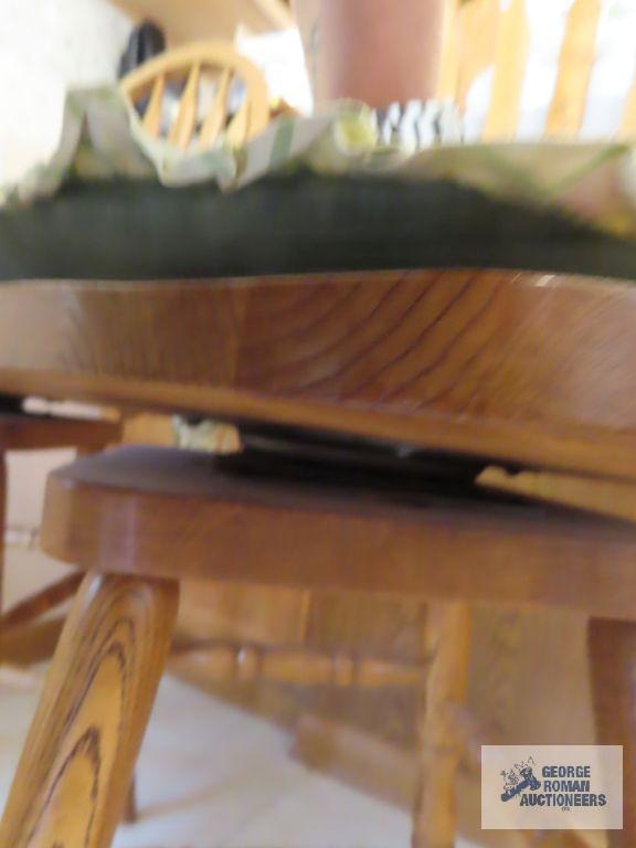 Two oak bar swivel stools. made in China