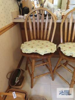 Two oak bar swivel stools. made in China