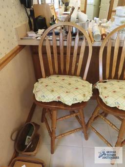 Two oak bar swivel stools. made in China