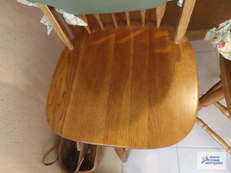 Two oak bar swivel stools. made in China