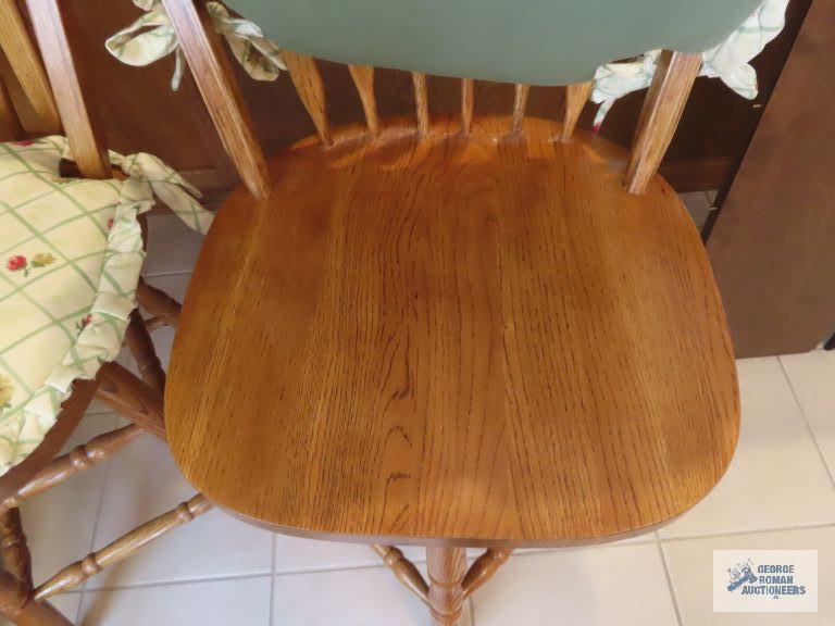 Two oak bar swivel stools. made in China