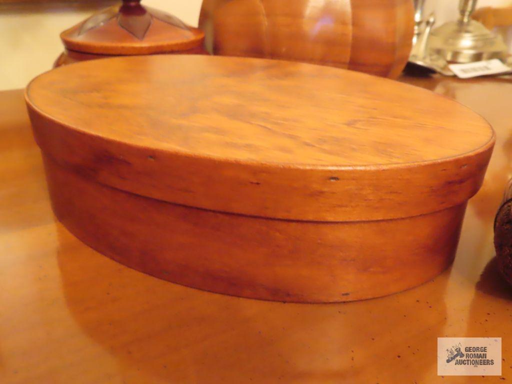 Wooden salad bowl, covered container, duck, and candlestick