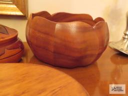 Wooden salad bowl, covered container, duck, and candlestick