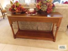 Oak finish sofa table with formica top