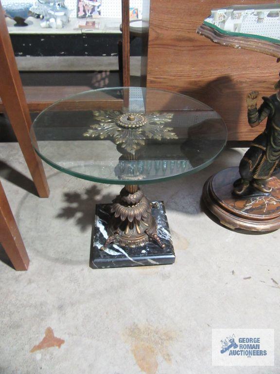 Decorative glass top accent table with heavy marble base. glass has chips.