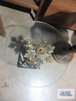 Decorative glass top accent table with heavy marble base. glass has chips.
