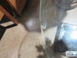 Decorative glass top accent table with heavy marble base. glass has chips.