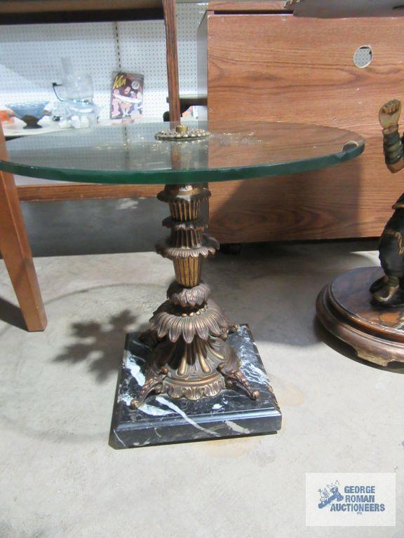 Decorative glass top accent table with heavy marble base. glass has chips.