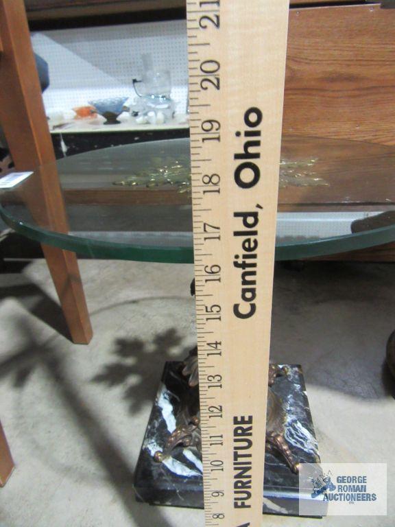 Decorative glass top accent table with heavy marble base. glass has chips.