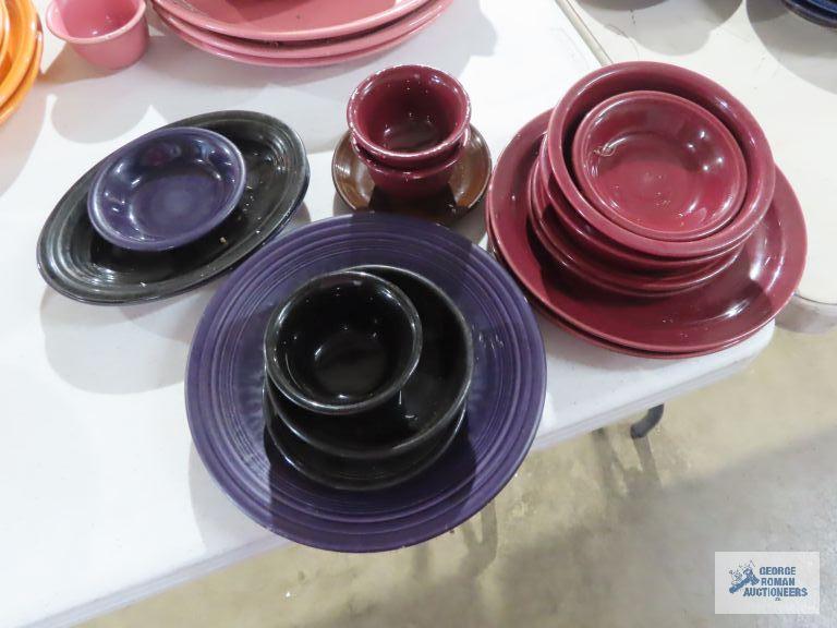 Assorted Fiesta dishware, cranberry, purple, and black
