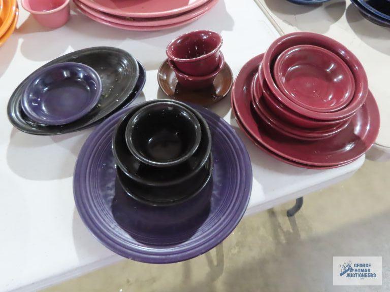 Assorted Fiesta dishware, cranberry, purple, and black