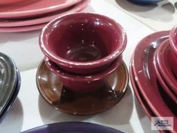 Assorted Fiesta dishware, cranberry, purple, and black