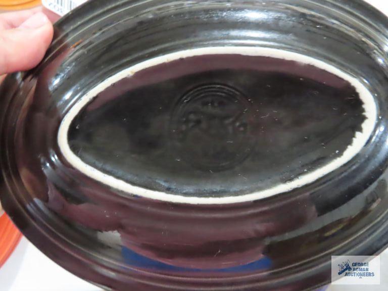 Assorted Fiesta dishware, cranberry, purple, and black