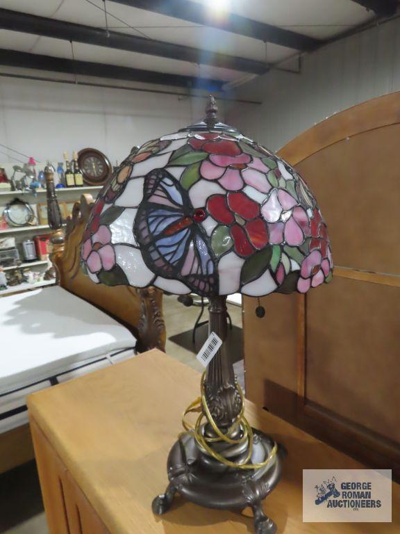 Metal floral based lamp with plastic tiffany style shade