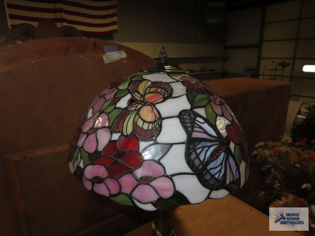 Metal floral based lamp with plastic tiffany style shade