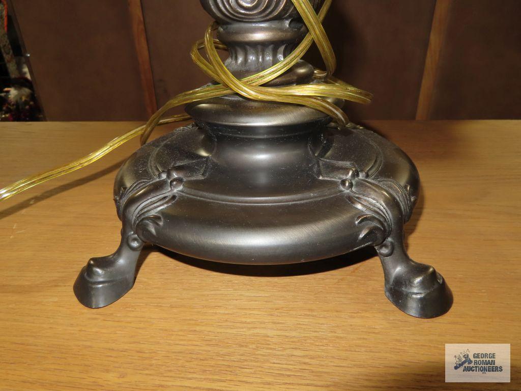 Metal floral based lamp with plastic tiffany style shade