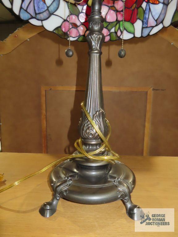 Metal floral based lamp with plastic tiffany style shade