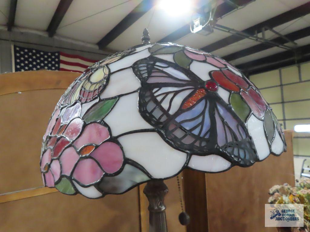 Metal floral based lamp with plastic tiffany style shade