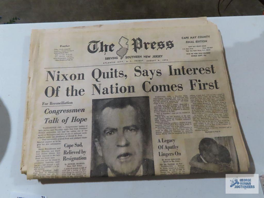 Presidential newspaper articles, tribute to John F. Kennedy book, victory in the gulf photo journal.