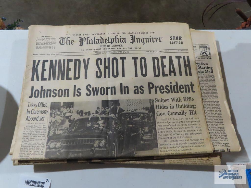Presidential newspaper articles, tribute to John F. Kennedy book, victory in the gulf photo journal.
