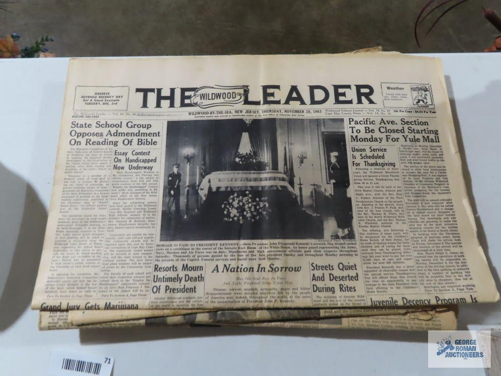 Presidential newspaper articles, tribute to John F. Kennedy book, victory in the gulf photo journal.