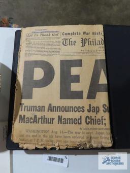 Presidential newspaper articles, tribute to John F. Kennedy book, victory in the gulf photo journal.