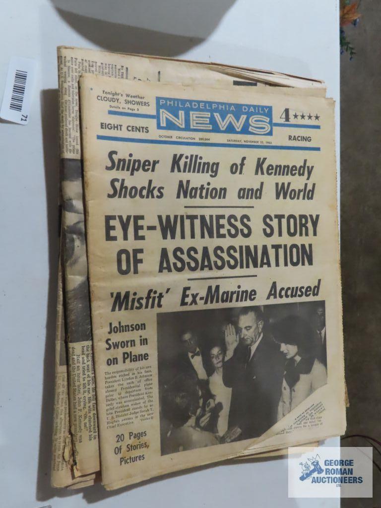 Presidential newspaper articles, tribute to John F. Kennedy book, victory in the gulf photo journal.