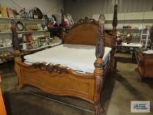 Ornate fruitwood claw foot, wood, metal and marble like bed, King size
