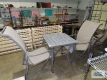 Metal outdoor table with two chairs