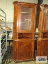 Antique mixed wood corner cabinet made by Carl Stocheck & Co.